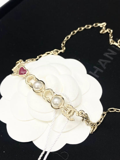 Chanel 17P gold letter pearl necklace