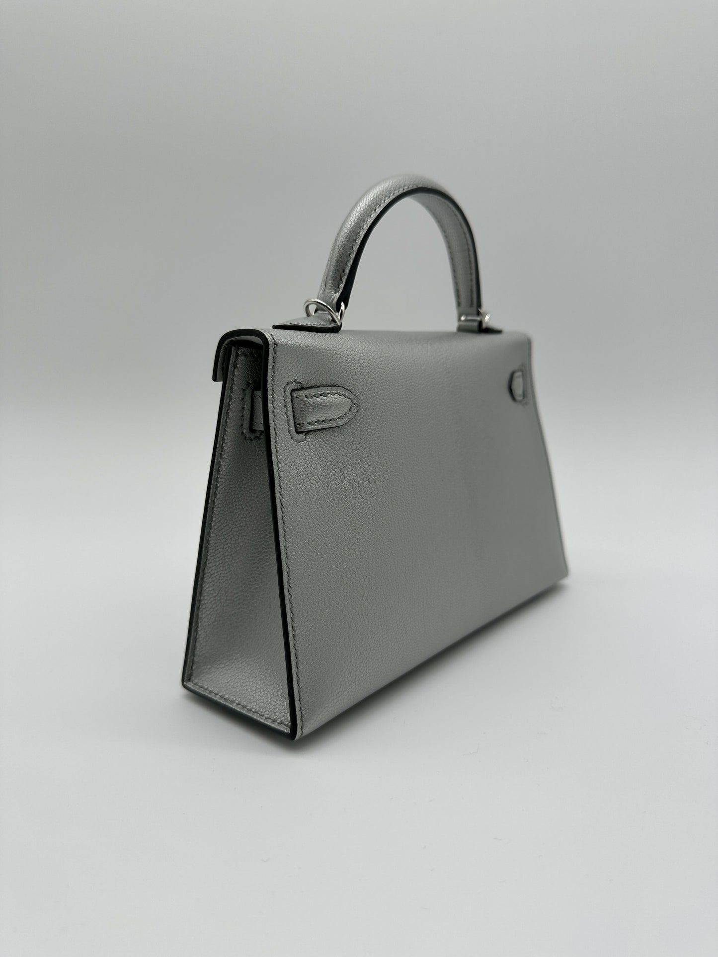 Hermès Kelly 20 Argent Chèvre PHW K 2026