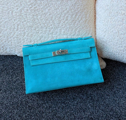 RARE! Hermes Doblis Kelly Pochette
Turquoise Suede Palladium hardware