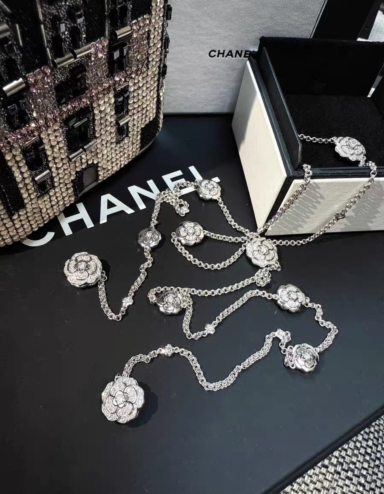 Chanel high jewellery 10 camellia flowers in 18k white gold and diamonds