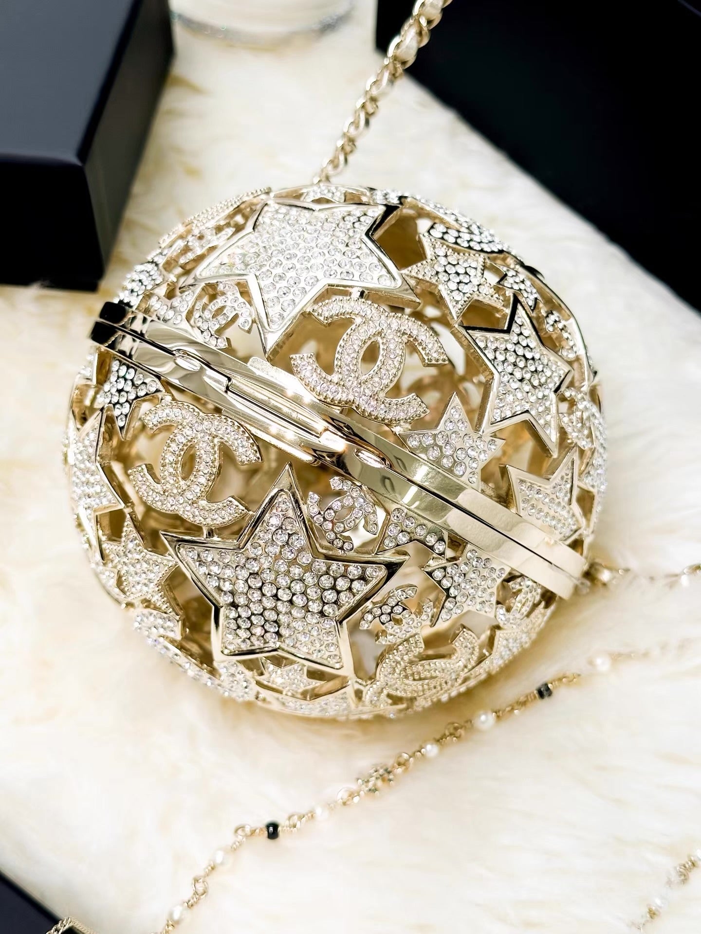 Chanel 25A gold star-patterned spherical evening bag