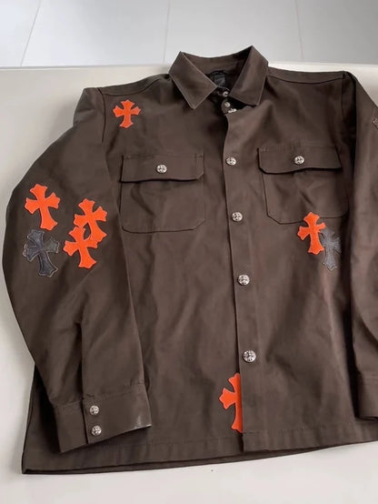 Chrome Hearts brown jacket with orange crosses
