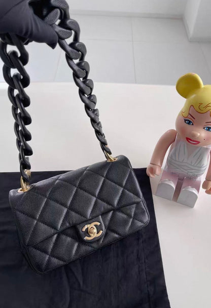 Chanel 24P Black leather wooden chain hardware