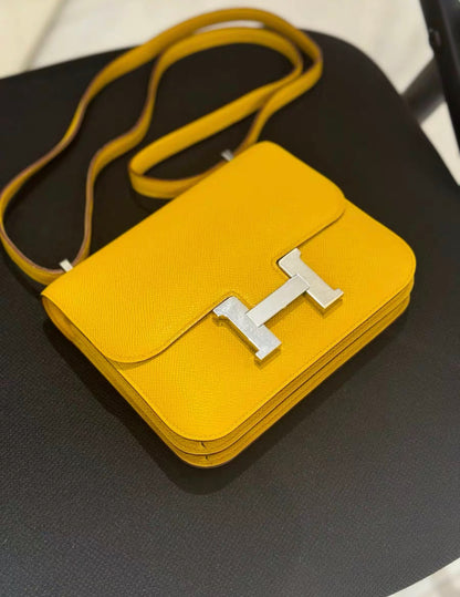 HERMÈS Constance Mini 19 shoulder bag in Jaune Ambre Epsom leather with Palladium hardware