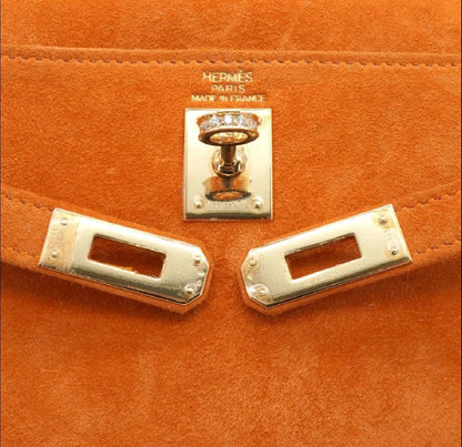 Hermès Kelly 25 Orange Doblis suede leather gold diamond hardware