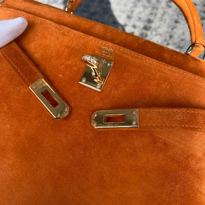 Hermès Kelly 25 Orange Doblis suede leather gold diamond hardware (Extremely rare)