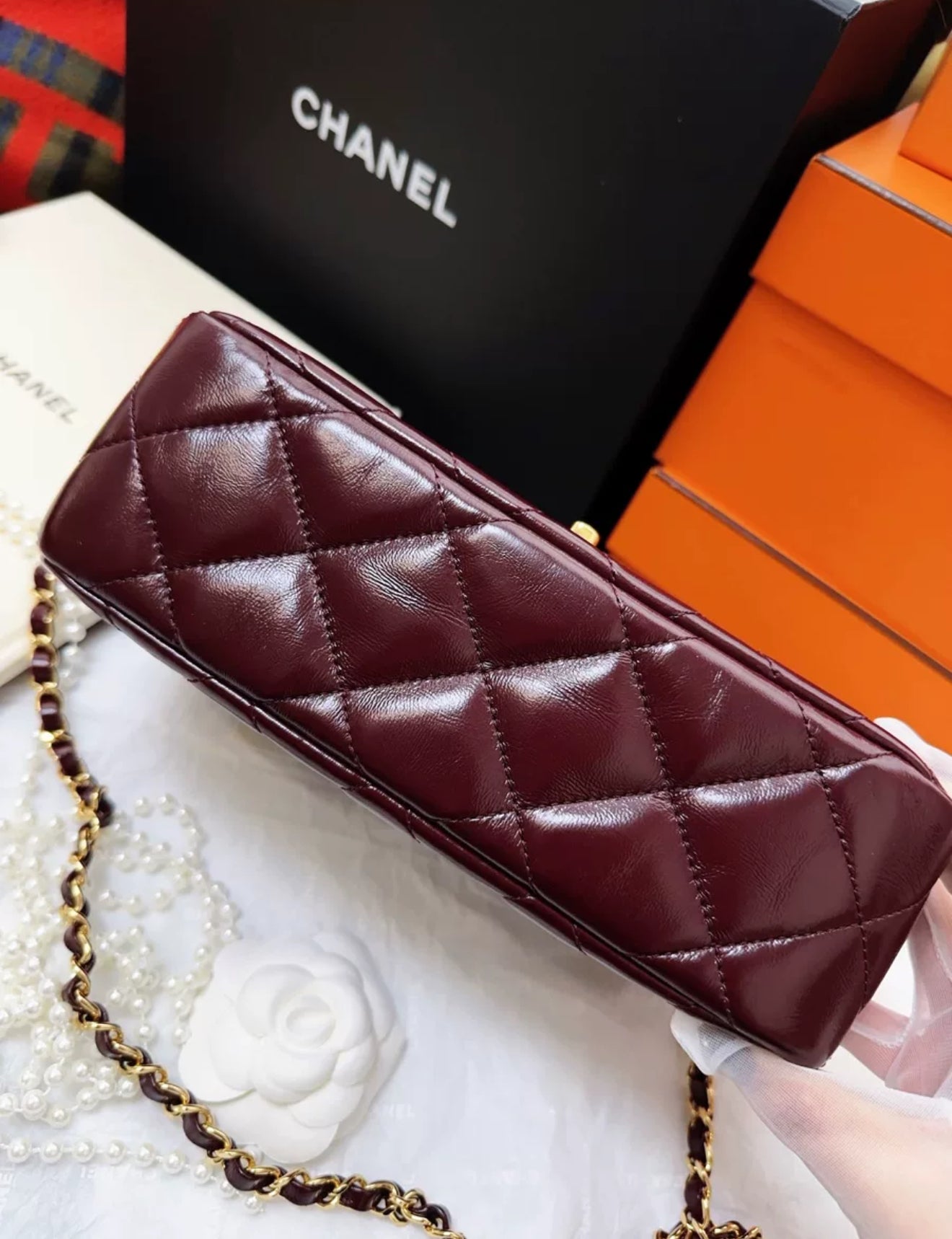 Chanel 24b burgundy sheepskin leather with gold chain top handle
