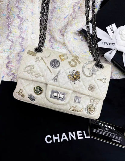 Chanel Pearl White Quilted Leather Limited Edition Lucky Charm Reissue 2.55 Classic Flap Bag