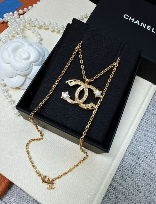Chanel 24C gold shooting star double C necklace