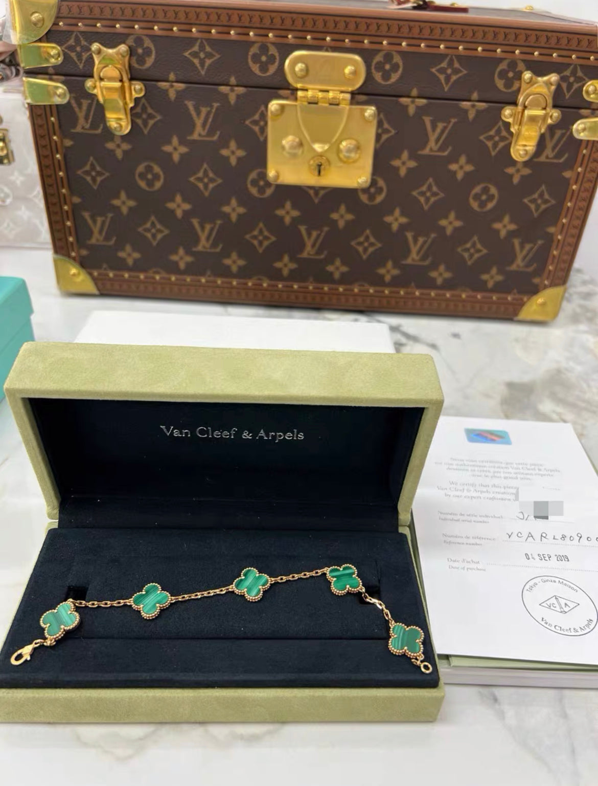 Van Cleef & Arpels Vintage Alhambra bracelet, 5 motifs
18K yellow gold, Malachite