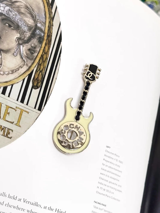 Chanel 24A enamel leather chain guitar-shaped brooch