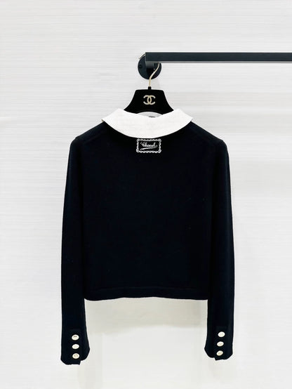 Chanel 25B black knit cardigan with white collar
