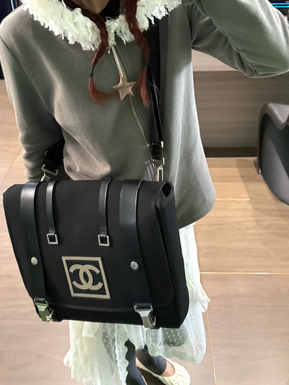Chanel Sport Logo 3-in-1 shoulder bag adorned with a striking black and white logo