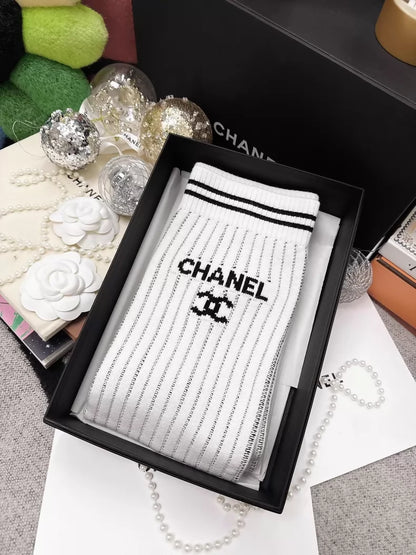 Chanel 24C white and black striped stockings