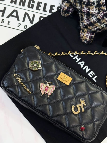 Chanel black quilted charms chain crossbody bag