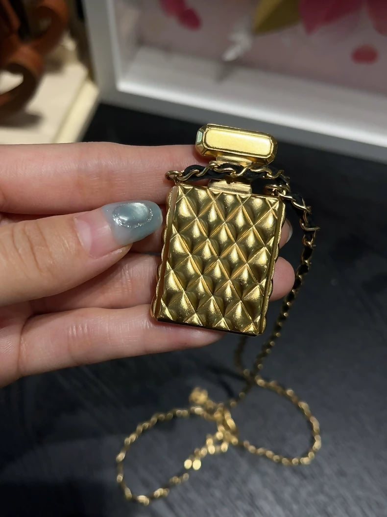 Chanel 22A gold quilted perfume bottle leather chain necklace