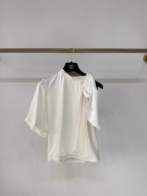 Chanel 24S ecru bow-tie satin off-the-shoulder blouse