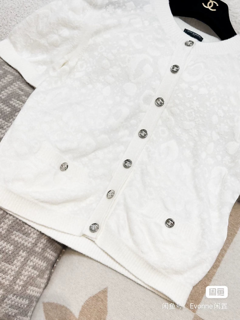 Chanel 23A white camellia cardigan