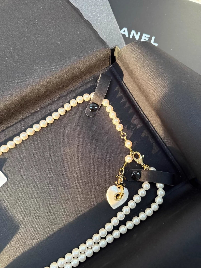 Chanel 24p heart-shaped pearl pendant waist chain