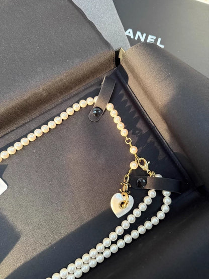 Chanel 24p heart-shaped pearl pendant waist chain