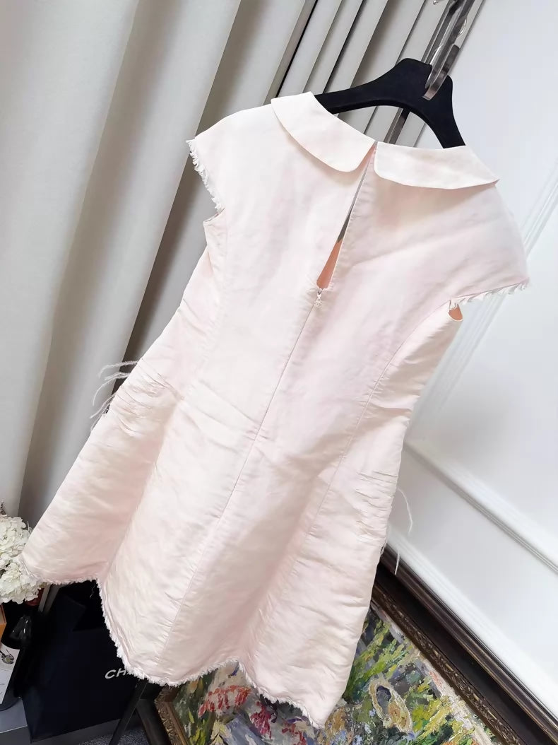 Chanel pink dress with a black tulle lining
