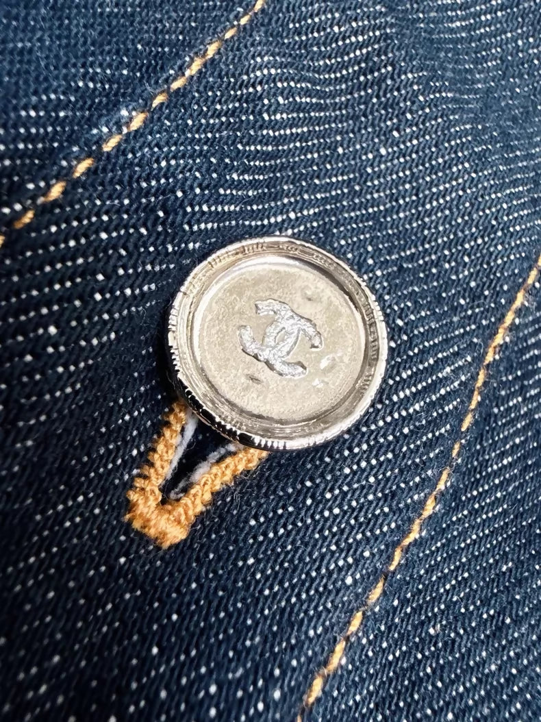 Chanel 25C navy blue denim jacket with silver buttons