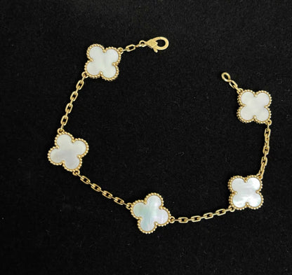 Vintage Alhambra bracelet, 5 motifs
18K yellow gold, Mother-of-pearl