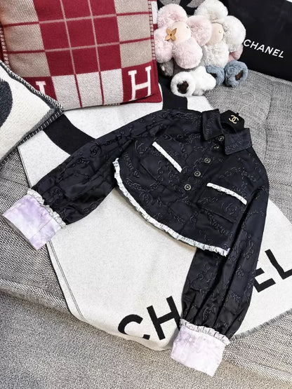 Chanel 22s black embossed double C logo jacket with purple gradient silk trim and two pockets