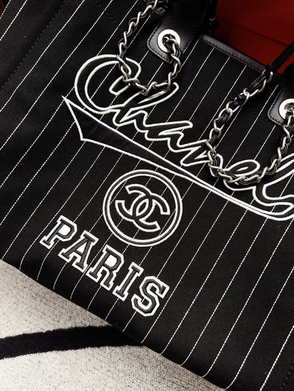 Chanel 23p black and white striped beach bag