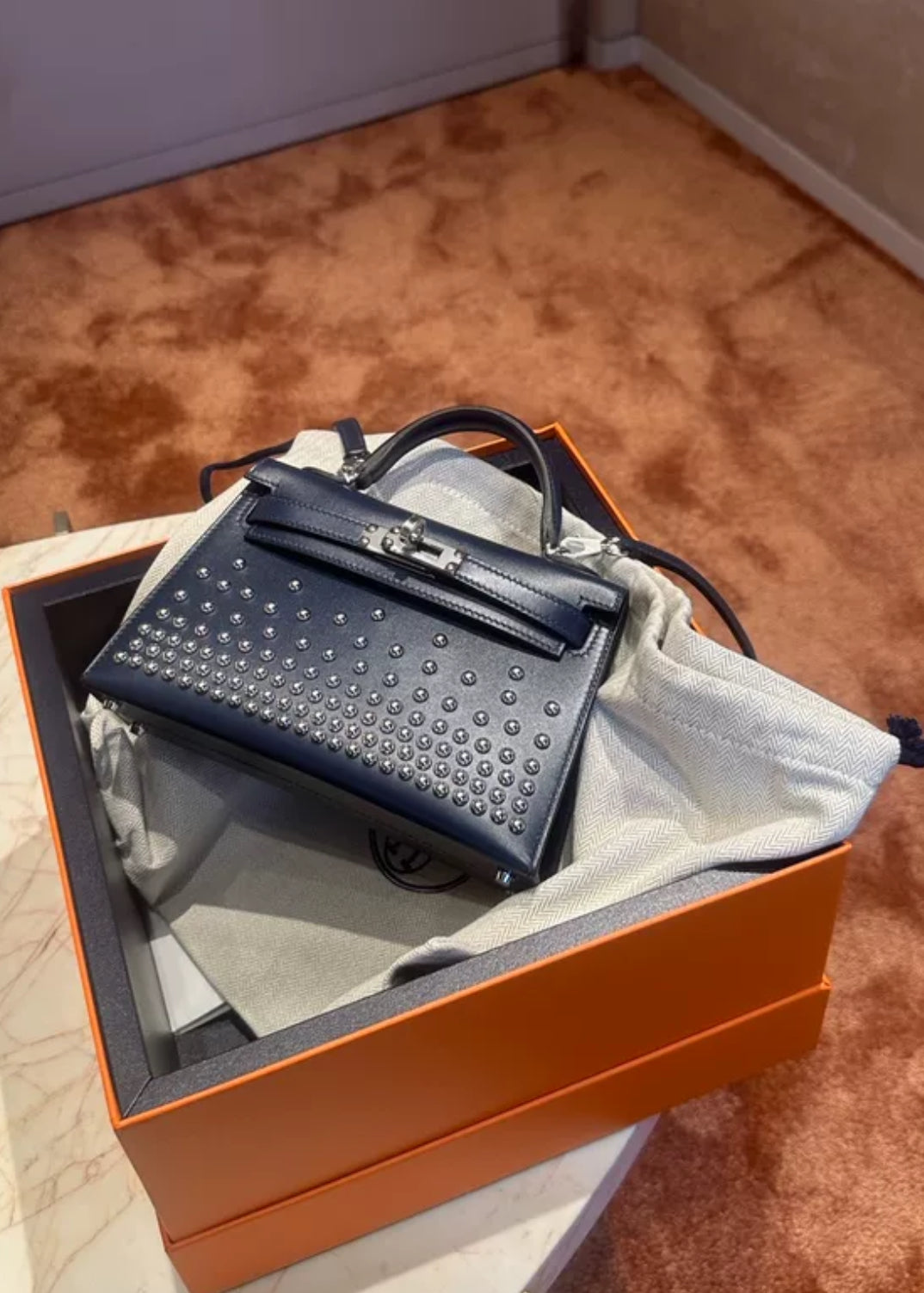 HERMÈS KELLY MINI CLOUTE BLEU ABYSS BOX CALF STUDDED LEATHER PALLADIUM HARDWARE