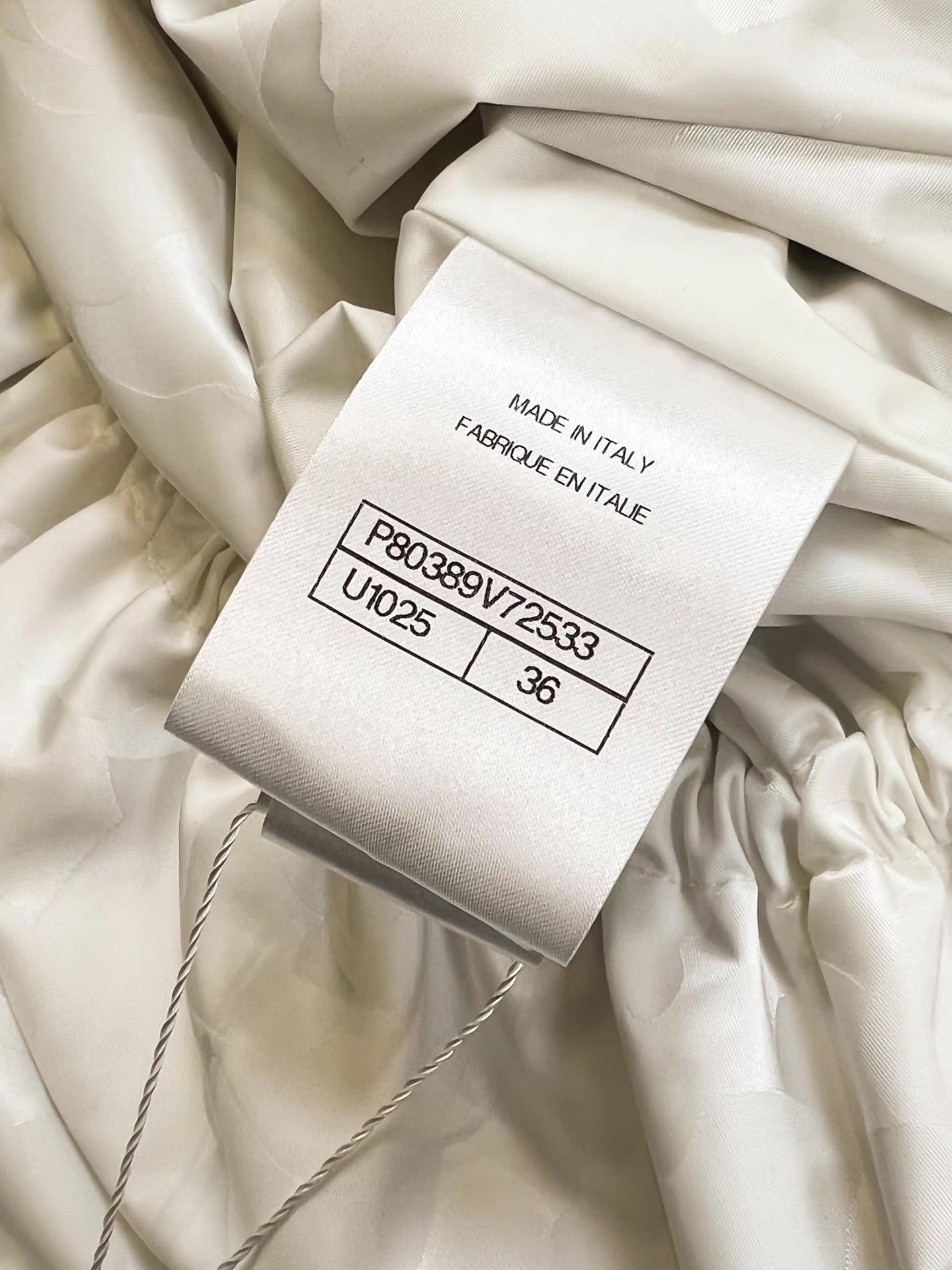 Chanel 25B trench coat with CC logo print