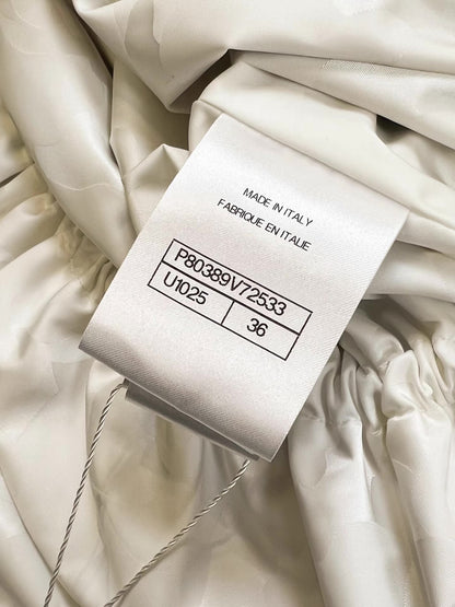 Chanel 25B trench coat with CC logo print