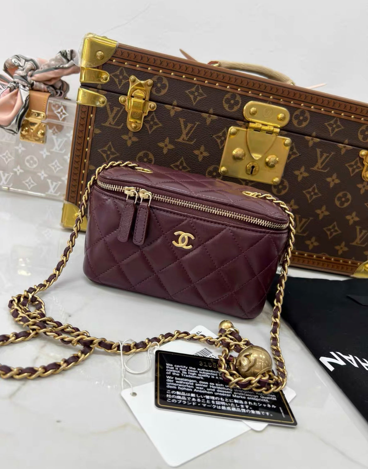 Chanel gold ball mini case chain bag in burgundy