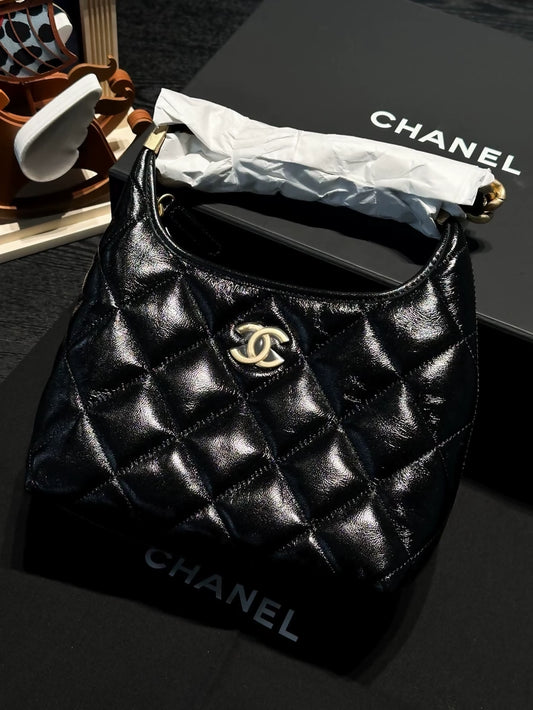 Chanel 24A black and gold waxed leather, small size cross body bag