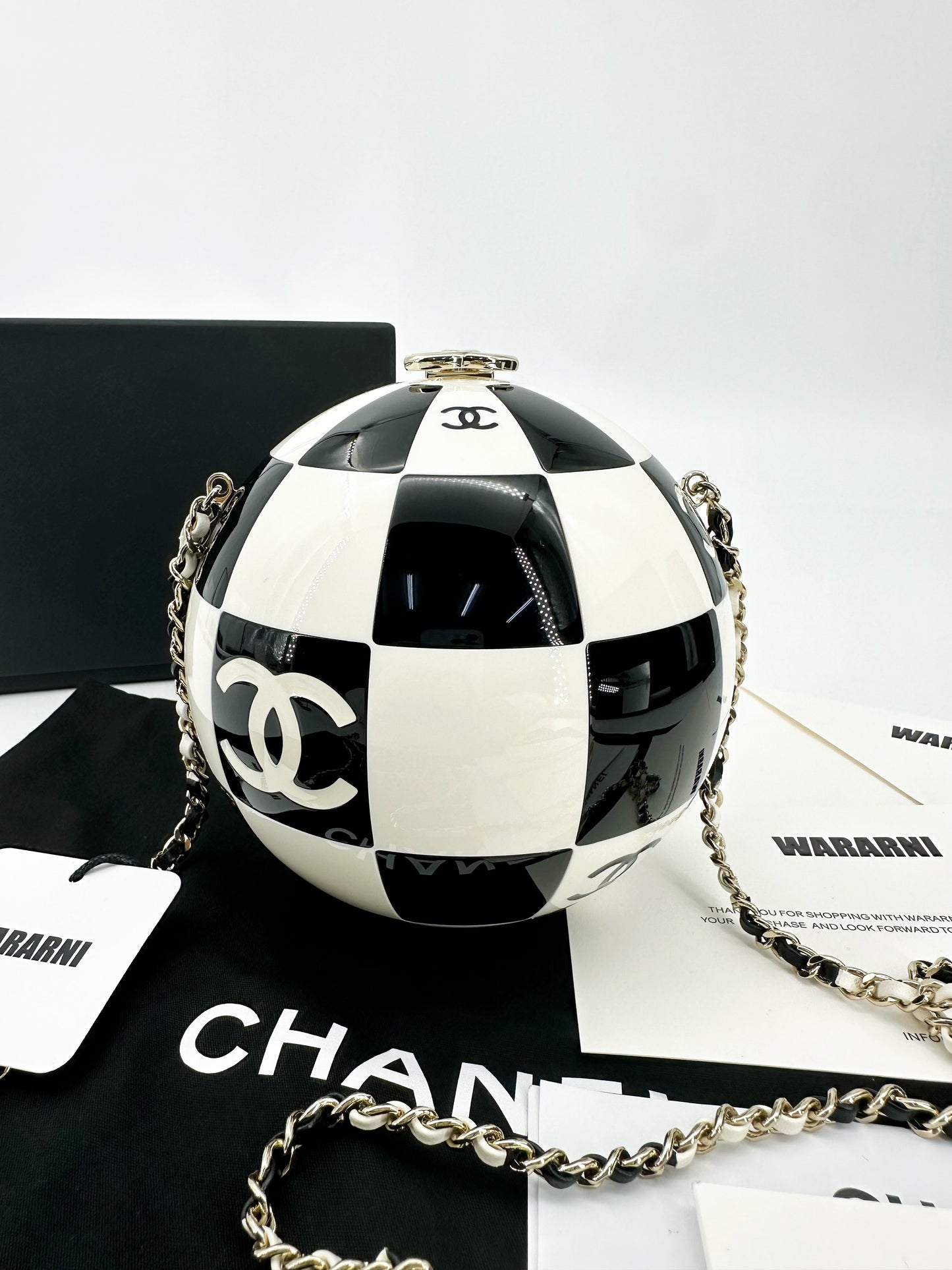 Chanel 23C Black and White Resin and Enamel Checker Sphere Minaudiere Pale Gold Hardware