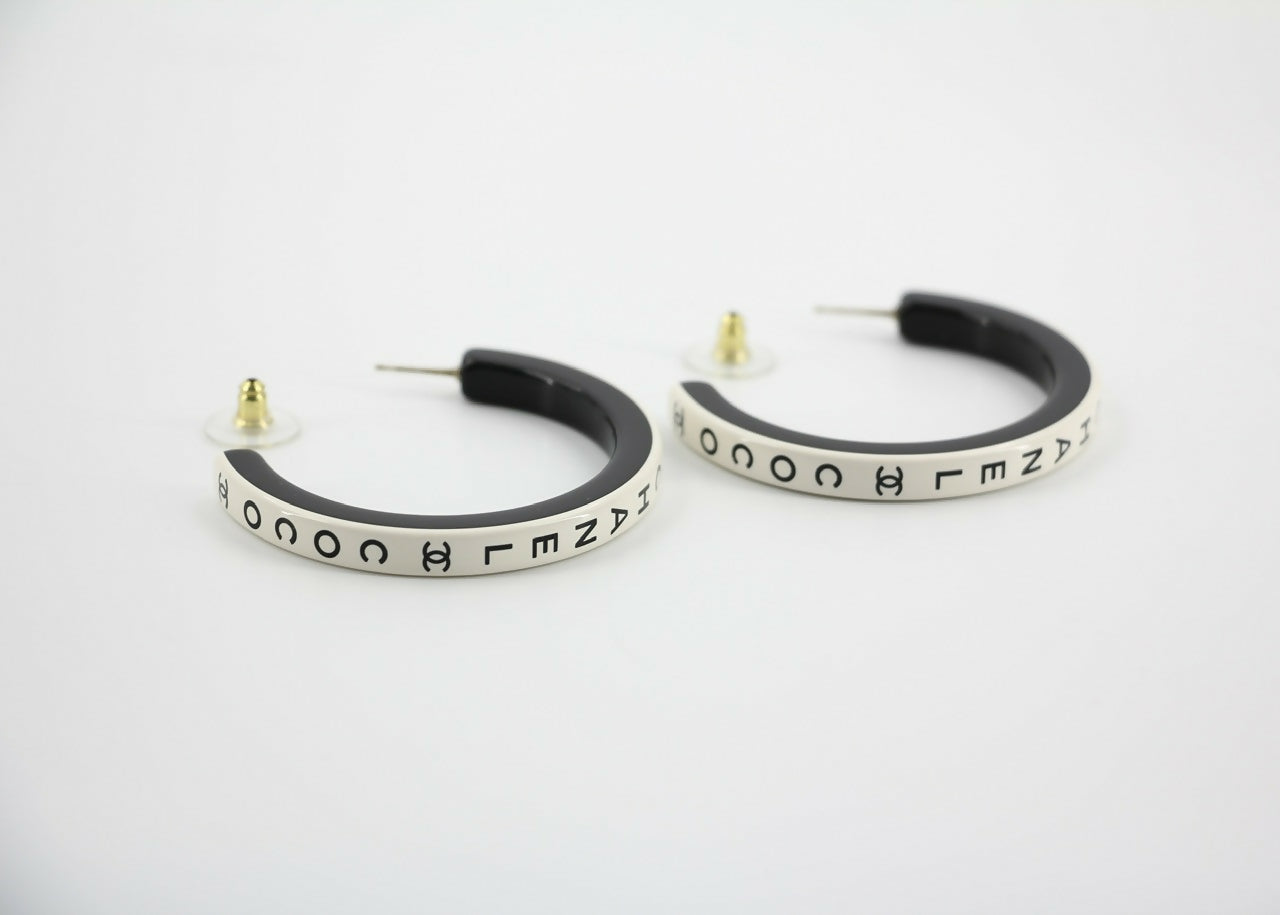Chanel B22S Resin White Curved COCO Motif Hoop Stud Earrings