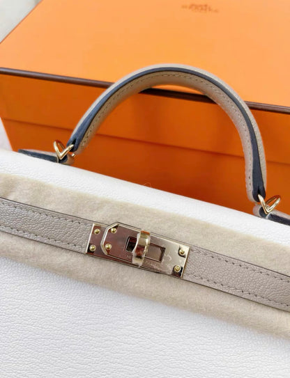 Hermès Special Order (HSS) Kelly 20 Nata and Gris Etoupe Chevre Permabrass Hardware stamp B, brand new