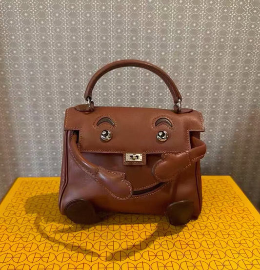 Rare Hermès Kelly doll Brown Gold Saddle leather palladium hardware