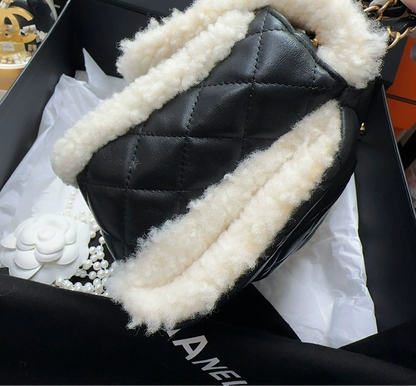 Chanel 21A black leather and white shearling flap bag