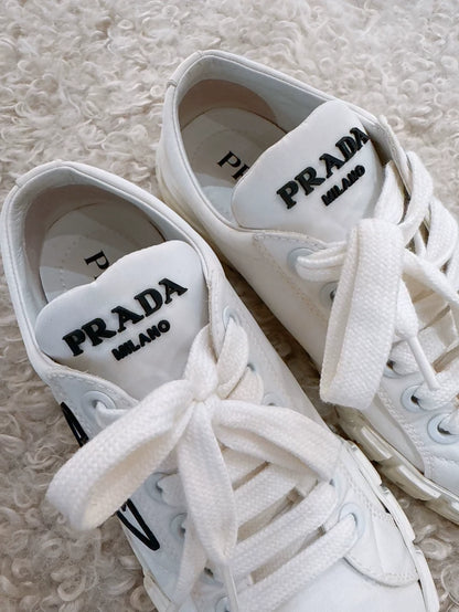 Prada classic triangle logo white gabardine biscuit shoes