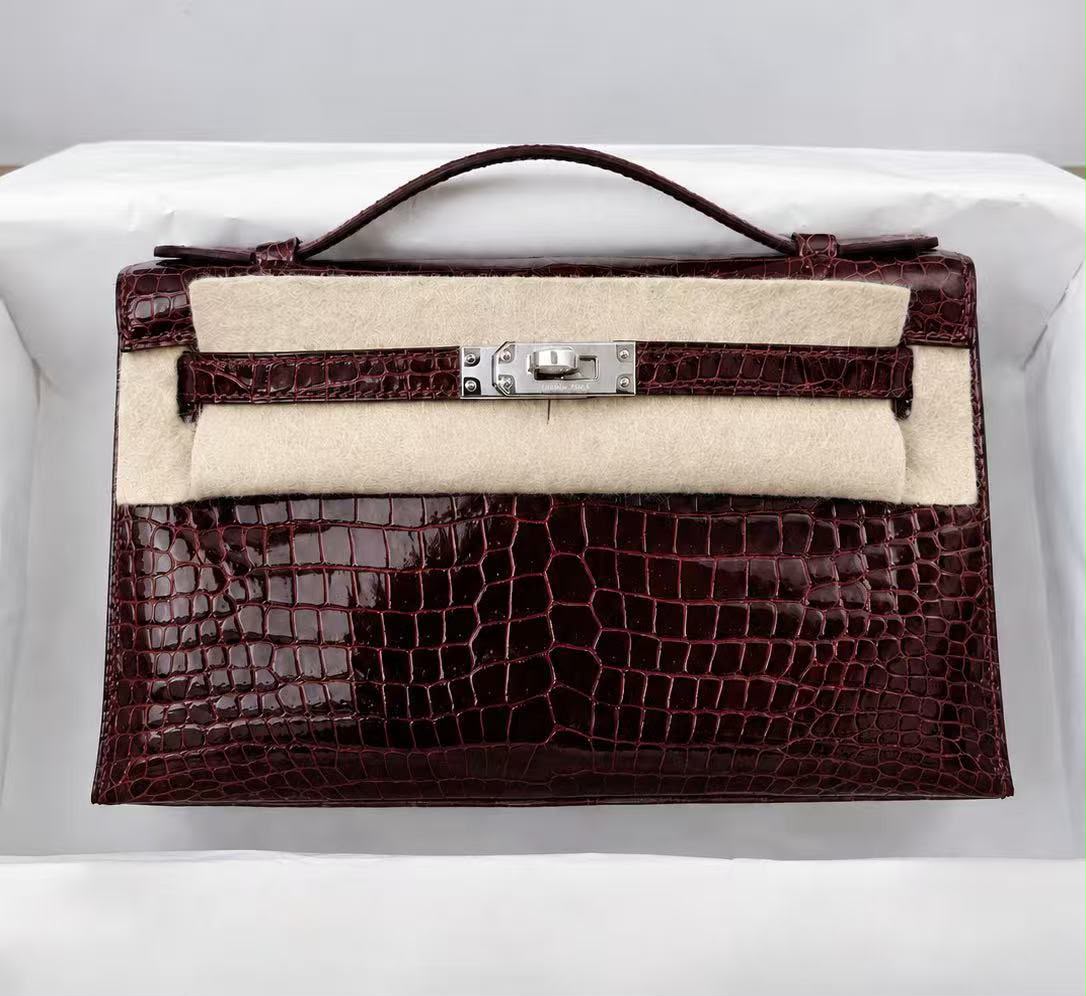 Hermes Kelly Pochette Bordeaux Shiny Porosus Palladium hardware