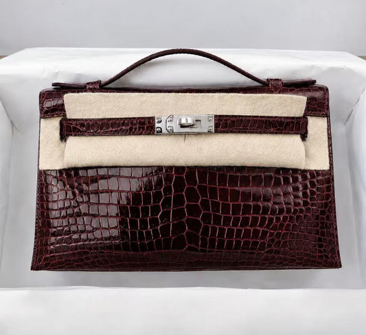 Hermes Kelly Pochette Bordeaux Shiny Porosus Palladium hardware