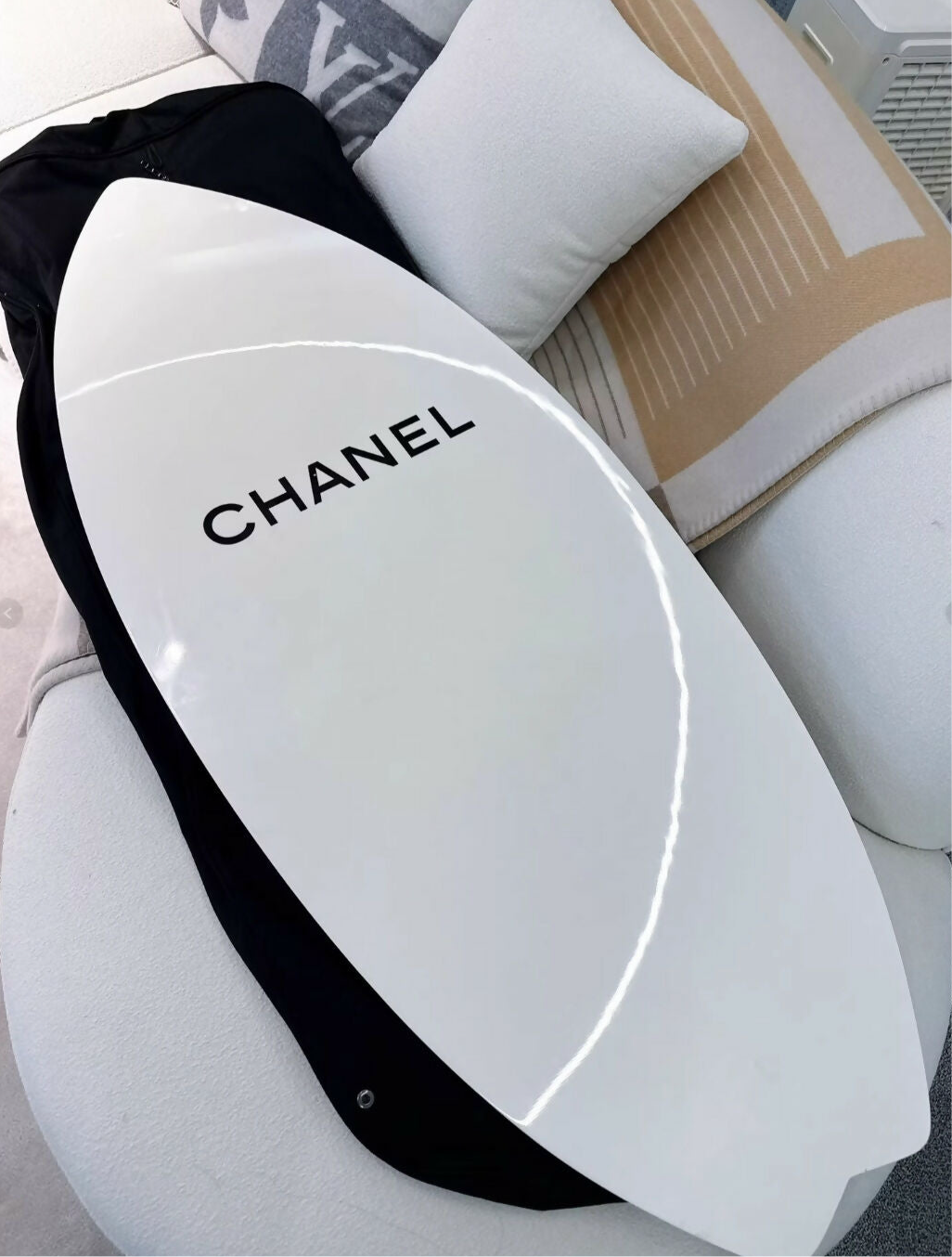 Chanel white surfboard