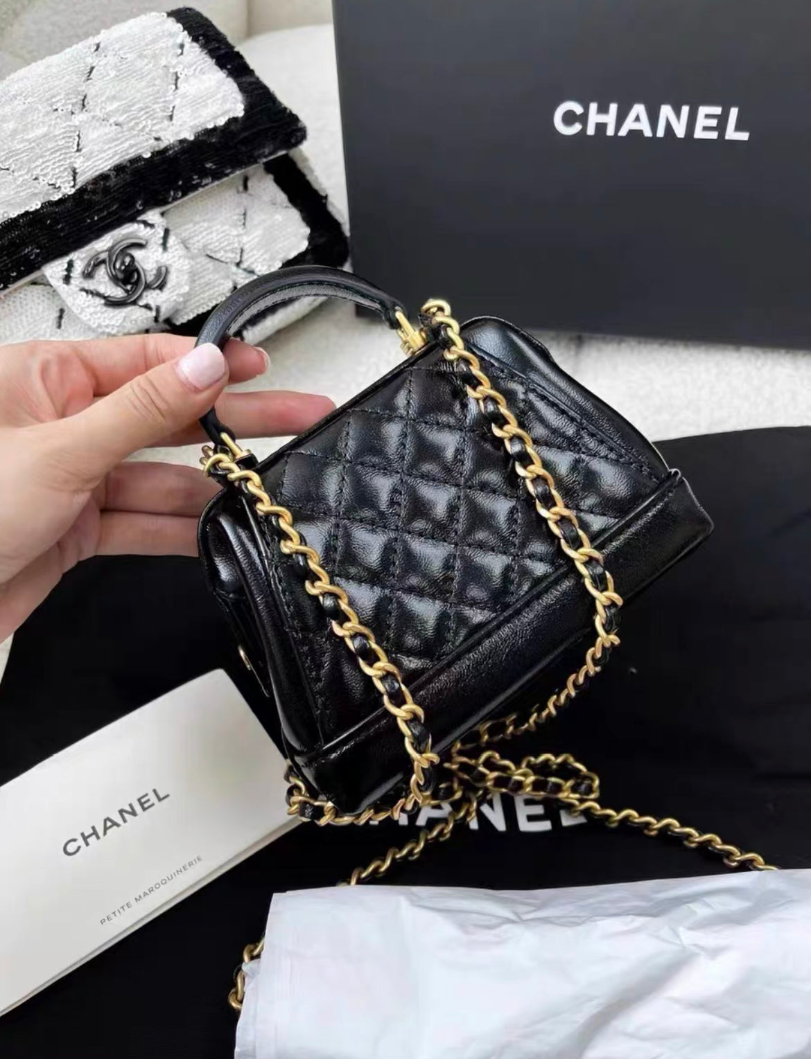 Chanel 24A Black shiny lambskin cocodoc mini bag