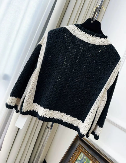 Chanel 22C Black and White Cardigan