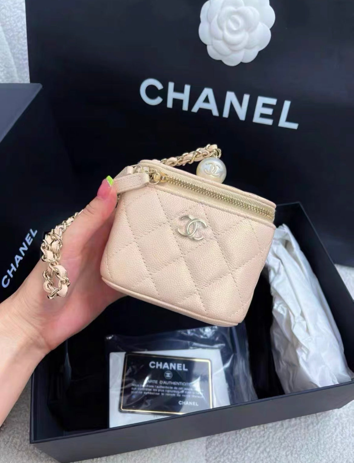 Chanel 21S pearl vanity case in beige leather