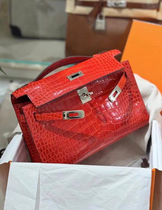 Hermès Kelly Pochette Red Shiny Alligator Palladium Hardware