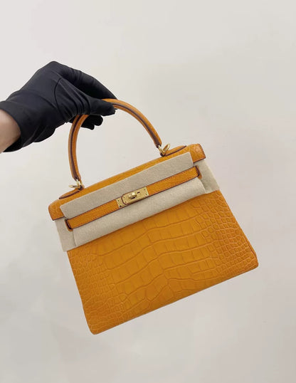 Hermès Kelly 25 Orange Matte Crocodile Gold Hardware