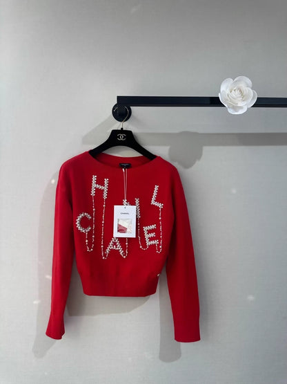 Chanel 21S Orange-Red Rhinestone Pearl Letter Link Knit Top Pullover Sweater