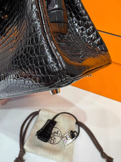 Hermes Birkin 25 black shiny leather crocodile leather with diamond hardware